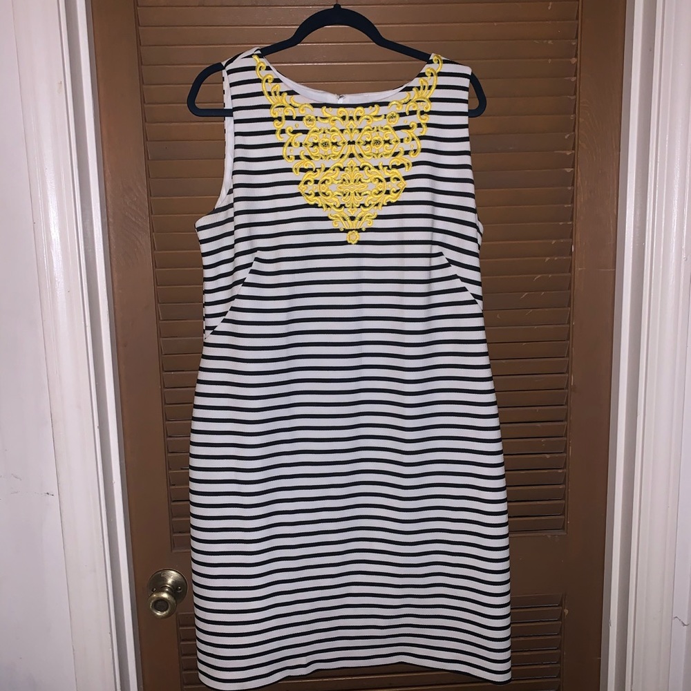 Black and white stripe fitted dress.